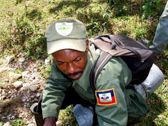 A park ranger, working as a guide for tourists.: Photograph courtesy of IDB